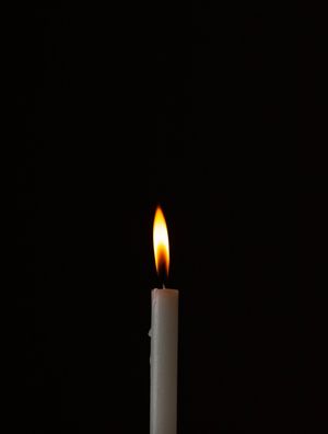 CANDLE IN THE DARK