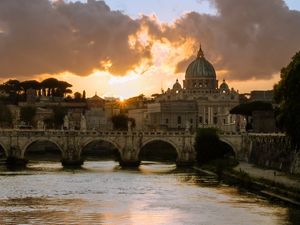SUNSET VIEW OF BASILICA ST PETER AND BRIDGE SANT ANGELO IN VATICAN