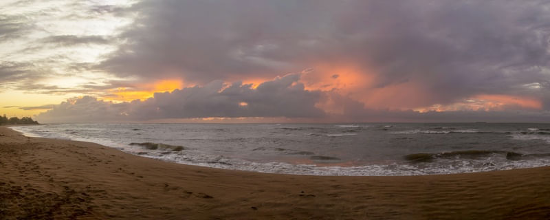 NASCER DO SOL COM NUVENS NA PRAIA DE CARAPEBUS
