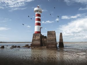 A LUZ DO SOL NO FAROL