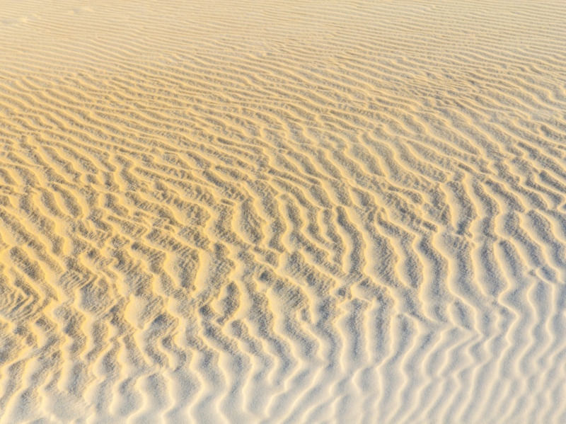 DESENHOS DO VENTO NA AREIA
