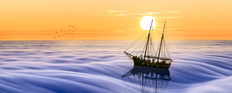 BARCO NAVEGANDO NAS NUVENS POR DO SOL