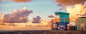 SUNRISE AT MIAMI BEACH