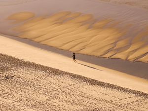 CORRIDA NA AREIA