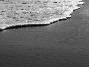 A PRAIA E A ONDA NA BEIRA