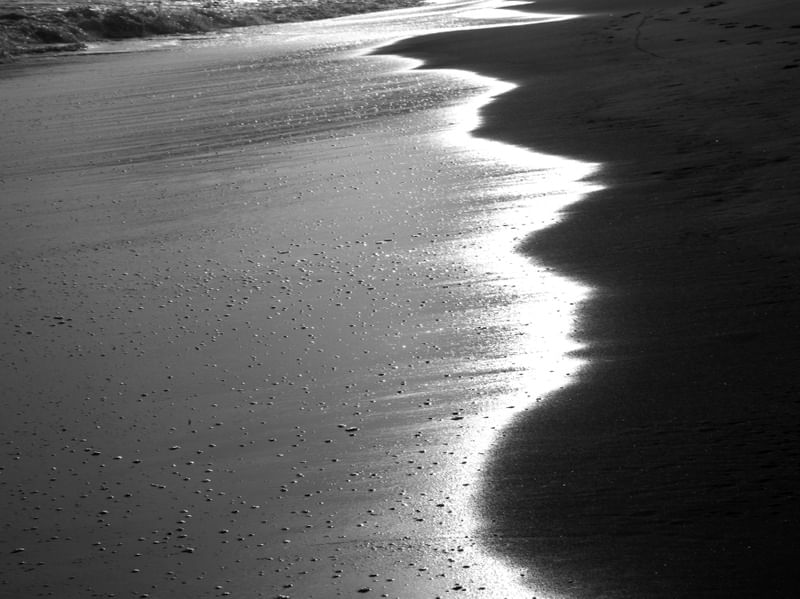 LUZ REFLETIDA NA ÁGUA