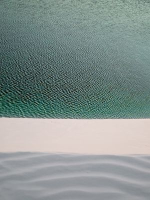 MEIO A MEIO MAR AREIA