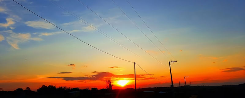 PÔR DO SOL AZUL E LARANJA PAN