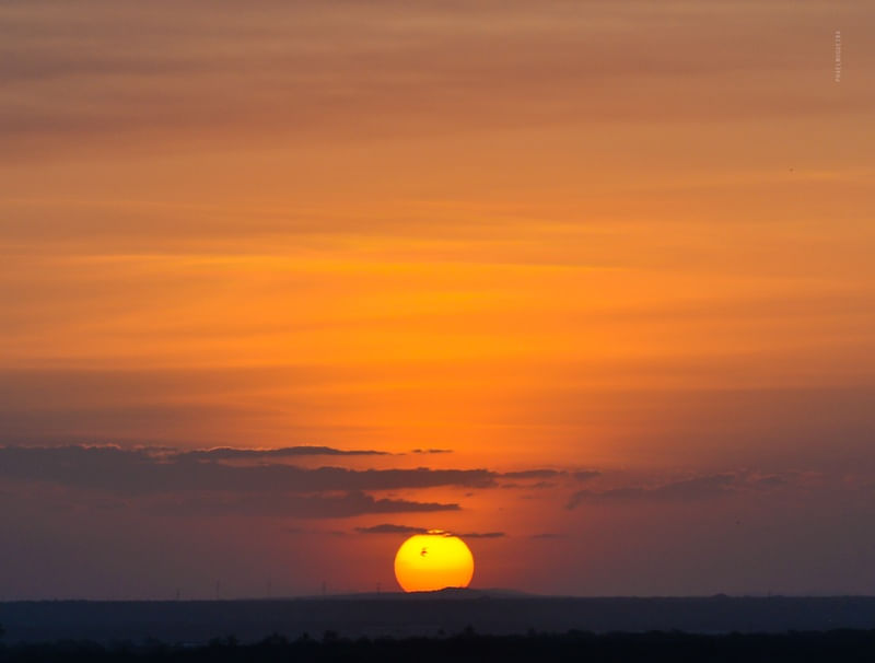 PÔR DO SOL EM CANOA QUEBRADA