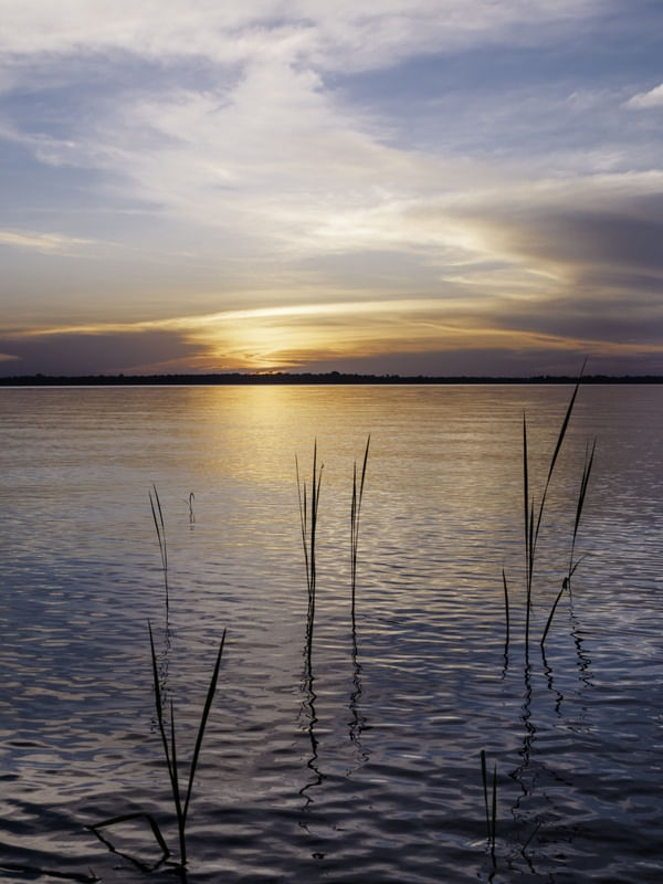 REFLEXOS DO PÔR DO SOL NO RIO MAUÉS