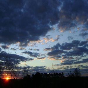SOL COM NUVENS