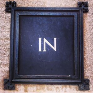 IN