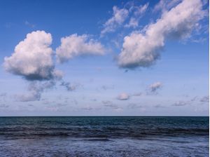 CLOUDS OVER THE SEA