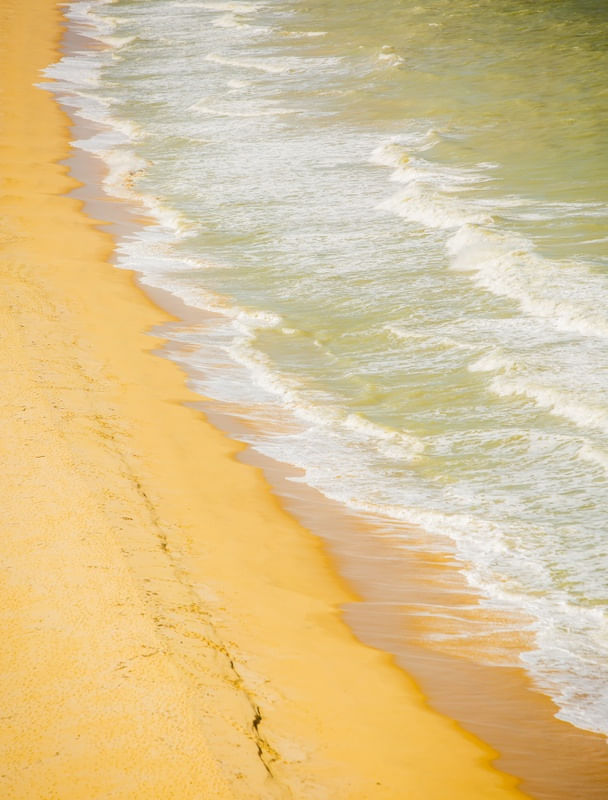 DESENHO DO MAR NA AREIA
