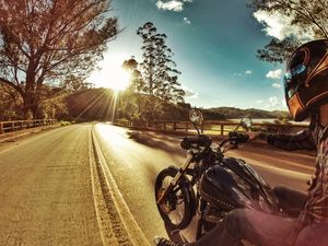 HARLEY, SUNSET AND A LAKE