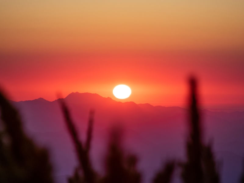 SUNSET IN THE MOUNTAINS