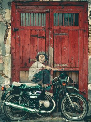 BOY ON MOTORBIKE