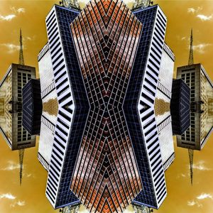 PREDIOS REFLETIDOS NAS CORES LARANJA E AMARELO