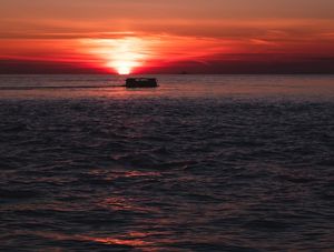 RED SUNSET IN A BUS