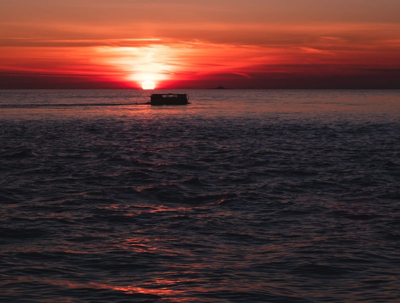 RED SUNSET IN A BUS