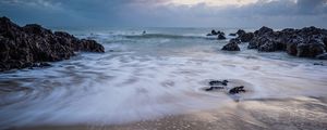 PANORÂMICA ESPUMA NA AREIA
