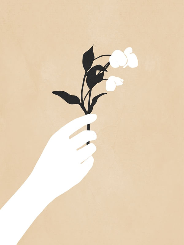HAND HOLDING FLOWER