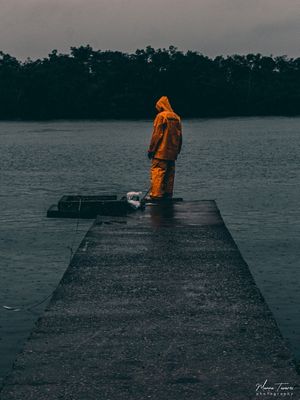 PESCADOR NA CHUVA
