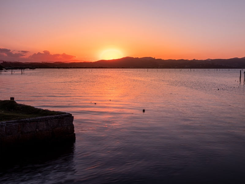 BELO POR DO SOL NA LAGOA