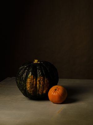 KABOCHA E TANGERINA STILL LIFE